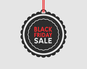 Hanging black tag featuring a scalloped edge and bold red Black Friday Sale text