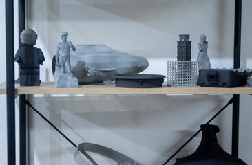 Many different art models from polyamide powder printed on 3D printer Technology