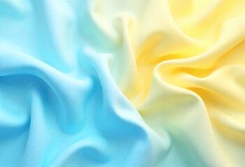 Obraz premium Smooth Fabric Draped With A Blue To Yellow Color Gradient