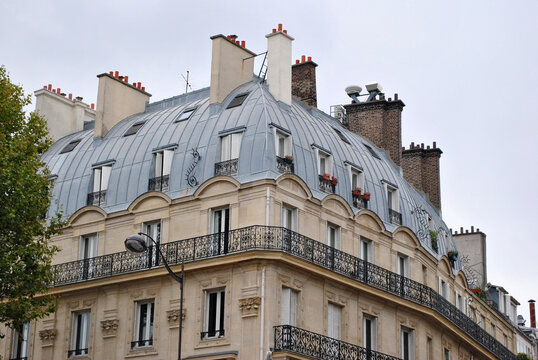 Large Mansard Roof on Old 19th Century Paris Apartment Building with Chimney Stacks