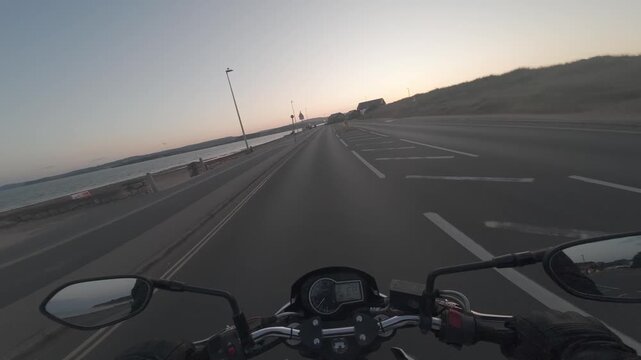 Motorbike Riding at Sunset on the Beach
