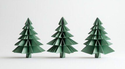 Obraz premium 3 origami-style paper fir trees. Isolated on pure white background. 3d illustration.