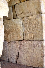 TURKIYE,HATTUSA,02-03-2024.It was the capital of the Hittite Empire. The earliest traces of settlement on the site are from the sixth millennium BC.In the photo ,Reliefs,Hieroglyphs ,writin