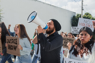Group of Latin people activists protesting on streets for peace and Human Rights in Mexico Latin America, Hispanic women and men together in a meeting for equality