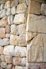 TURKIYE,HATTUSA,02-03-2024.It was the capital of the Hittite Empire. The earliest traces of settlement on the site are from the sixth millennium BC.In the photo ,Reliefs,Hieroglyphs ,writin