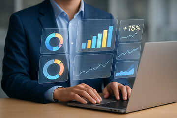 Hand using laptop with digital analytics interface, business performance metrics and financial data visualization for strategy planning