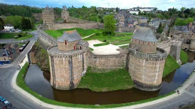 Chateaugiron Castle, Brittany, Ille-et-Vilaine department in France - picturesque medieval fortiefied village near Rennes. aerial drone 4k hd video