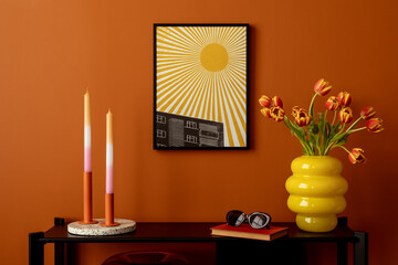 Modern arrangement with mock up poster frame, flowers in yellow vase, and decorations. Fresh and...
