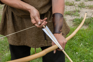 Heavy war bow with over 100 pounds draw weight and heavy arrow shaft, medieval longbow archery