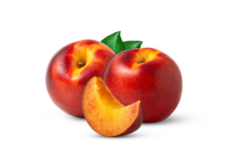 Juicy nectarine peach and slice with green leaves isolated.
