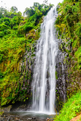 Fototapeta premium View of Materuni waterfall at foot of mountain Kilimanjaro not far from the city Moshi, Tanzania