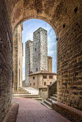 Fototapeta premium Downtown view on the towrs of San Gimignano, Italy