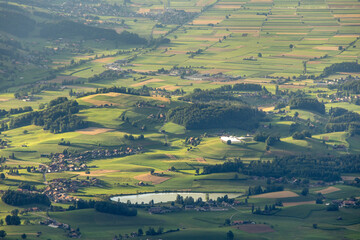 Serene Swiss Gürbetal Valley with Rolling Hills and Lake
