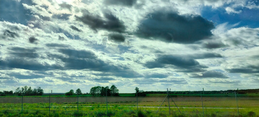 Scenic Rural Landscape with Cloudy Sky