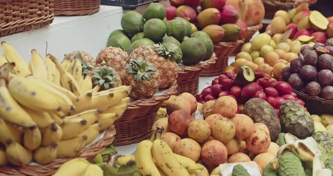 Shot of tropical fruit display at Lavradores Market, Madeira Island, full of color and variety.