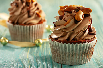 cupacke with on blue wooden table