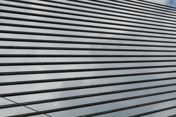 Abstract diagonal lines background. Texture of metal cables from a large cable-stayed bridge in perspective