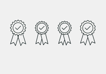 Vector illustration of four award ribbons with checkmarks
