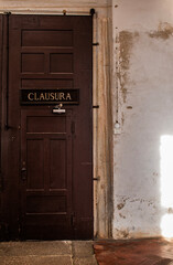 Italy, Europe: corridor with the door of the Clausura, the area strictly reserved for cloistered...