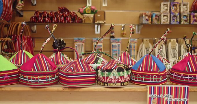 Madeiran earflap caps, known as "Barrete de Orelhas," on display at Lavradores Market, Madeira