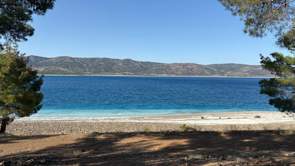 Blue lake scenery. River, trees, sky. Lake in Turkey drone view. High quality photo