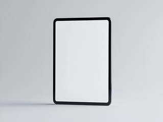 A modern black tablet computer with a blank white screen stands vertically on a clean, light gray background.