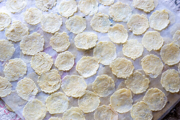 The process of making emping melinjo (melinjo chips). It tastes a little bitter and very tasty....
