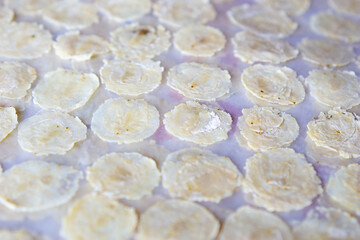 The process of making emping melinjo (melinjo chips). It tastes a little bitter and very tasty. Melinjo is also known as Gnetum gnemon