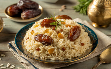 National dishes of Bahrain - Muhammar - a rice dish made from local rice with dates or sugar