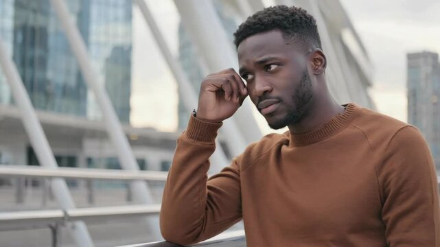 Businessman with worried expression thinking about challenges and opportunities ahead