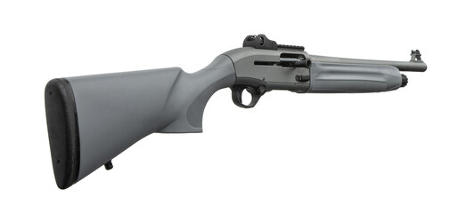 Tactical gray shotgun featuring polymer stock and rail system, laid out horizontally against a...