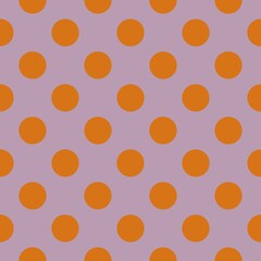 A symmetrical pattern of orange polka dots is set against a muted lavender background. The design creates a playful and vibrant visual effect.