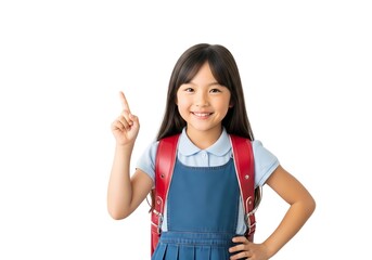 笑顔で指差す小学生の女の子