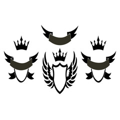 Obraz premium Vector graphics of heraldic shield crown and wings for logo design and decoration