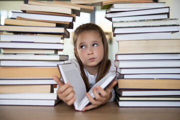 Thoughtful Girl Surrounded by Books