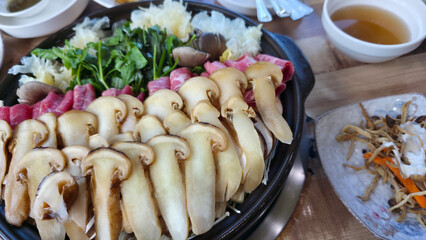Korean Hot Pot with Raw Beef, Mushrooms, and Vegetables