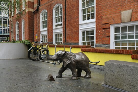 LONDON, UK - JULY 9, 2024: Public space artwork Baby Tembo by sculptor Derrick Hudson at LSE London School of Economics and Political Science campus in London, UK.