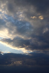 Dramatic sky with sun rays.