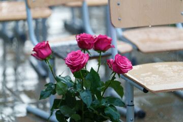 the audience leaves their seats outdoors because of the rain © talavietis