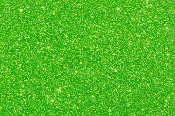 Green glitter texture background. Photo can be used for the concept of New Year, Christmas and all celebration background concepts.