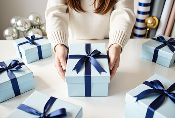 Gift boxes with ribbons arranged on a festive table for celebration