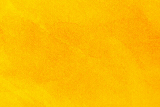 Abstract bright texture of yellow paint background.