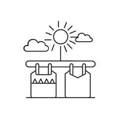 Laundry drying on a clothesline under the sun and clouds isolated on white background