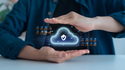 Business hands shielding a digital cloud with a checkmark and data icons, symbolizing secure cloud...