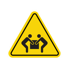 Yellow triangular warning sign with two figures carrying a heavy box