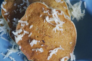 Banana pan cake with cheese sprinkled on top
