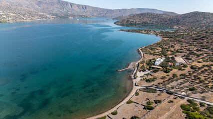 panoramic drone view of coastal sea water and rocky shore near Crete island