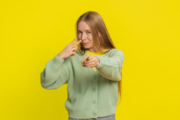 I am watching you. Confident attentive Caucasian middle-aged woman pointing at eyes and camera,...