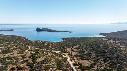 panoramic drone view of coastal sea water and rocky shore near Crete island