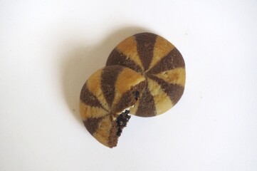 two black and white patterned biscuits
